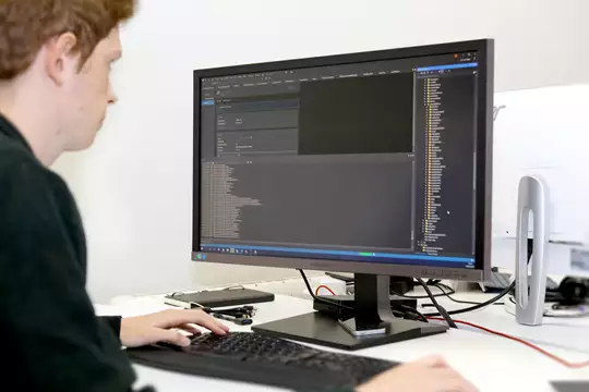 A developer working on a PC