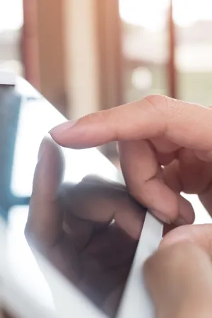 close-up-businessman-using-digital-tablet-office.jpg